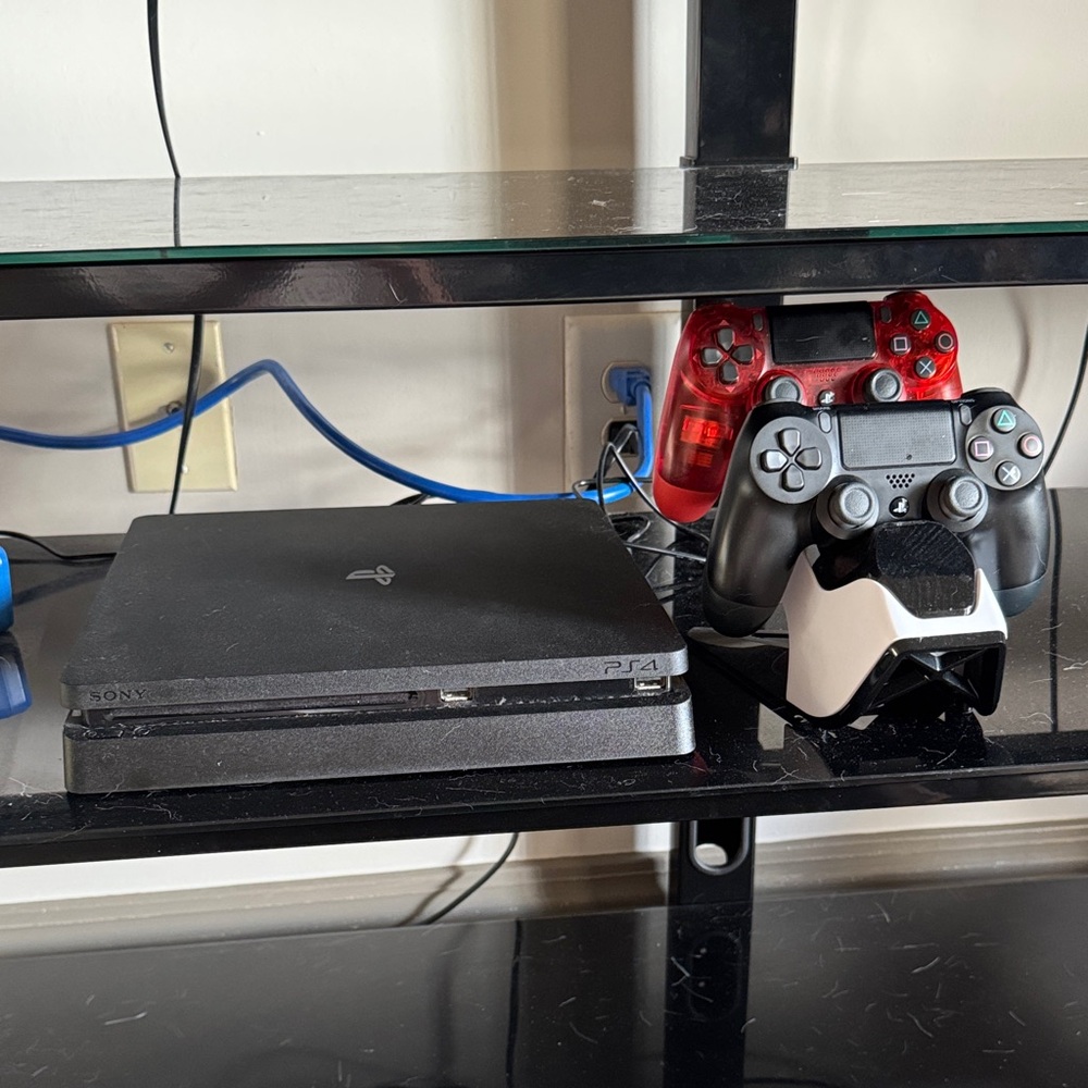 Sony PS4 Slim Console with Black and Orange Controllers with Charging Station